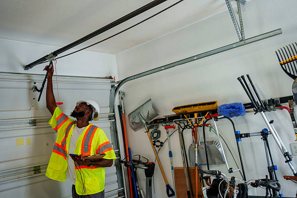 Professional Garage Door Panel Replacement technician working in Gore, OK